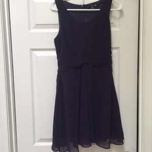 Purple party dress with bow